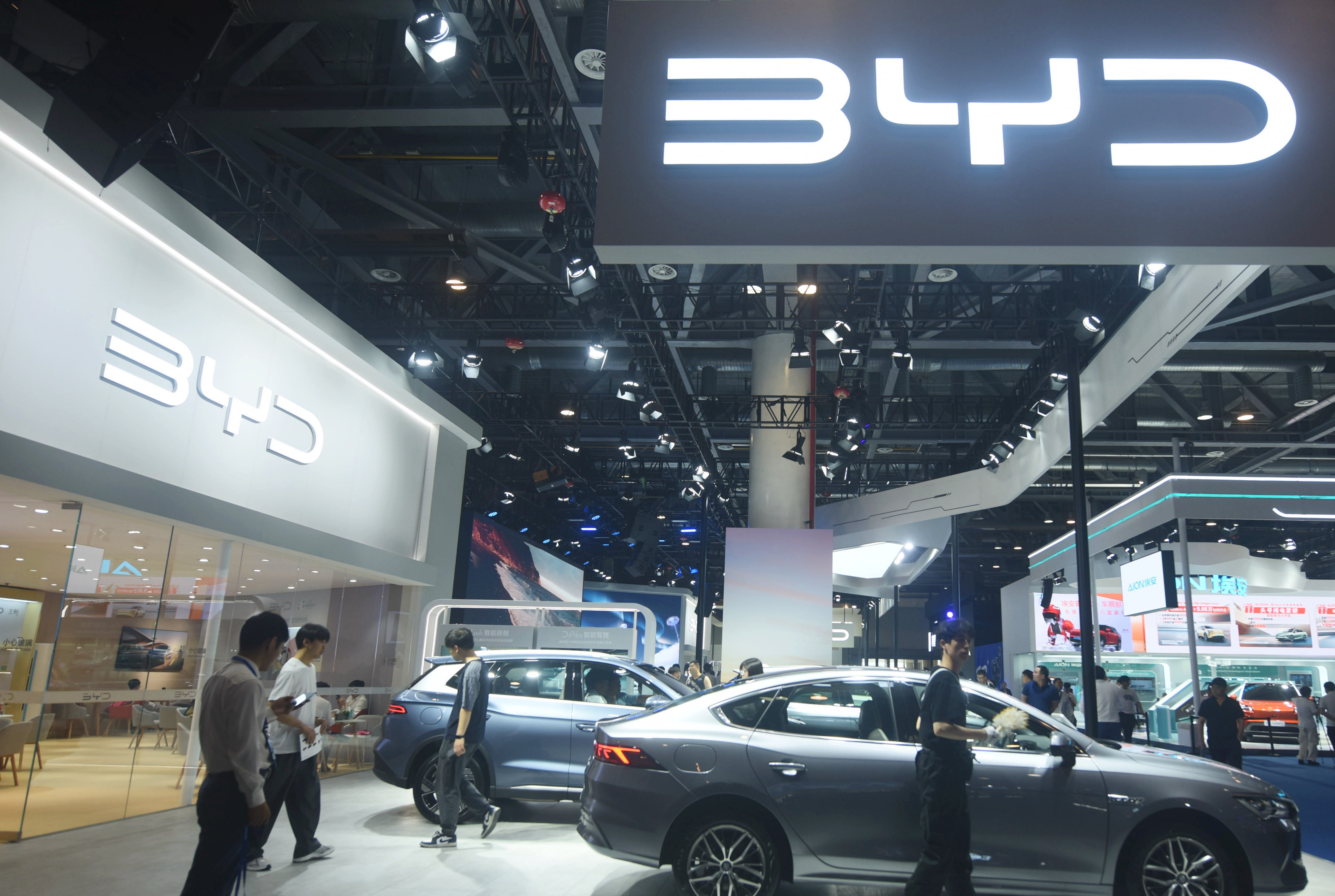 HANGZHOU, CHINA - JUNE 13, 2024 - Visitors look at BYD's electric cars at an auto show in Xiaoshan district of Hangzhou city, capital of East China's Zhejiang province, June 11, 2024. On June 13, 2024, the European Commission said on June 12 that it would impose tariffs of 17.4%, 20% and 38.1% on China's BYD, Geely Automobile and SAIC Motor, respectively. (Photo credit should read CFOTO/Future Publishing via Getty Images)