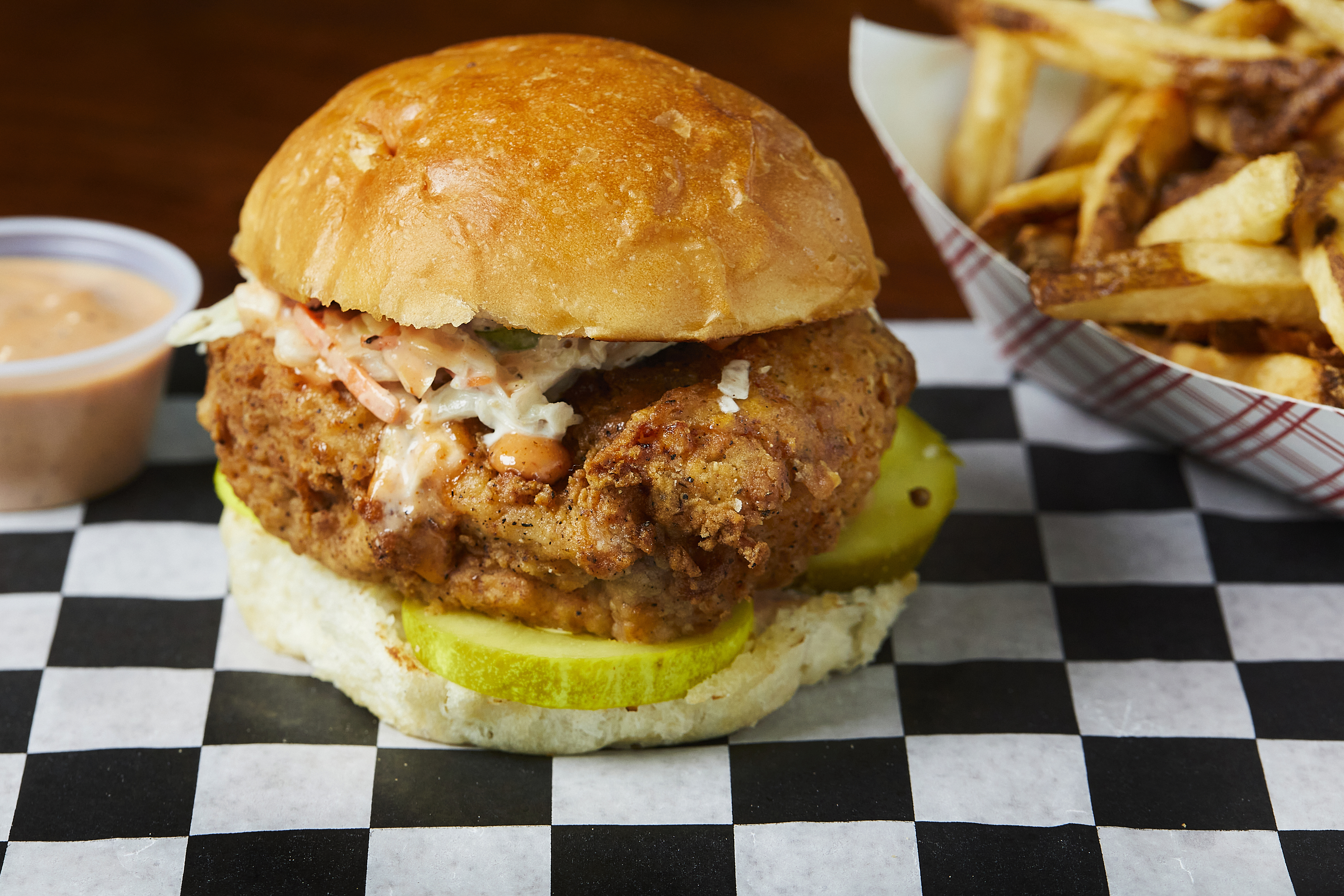 SILVER SPRING, MD - JANUARY 11: Fryer's Chicken Sandwich - hand breaded  chicken breast on a toasted Woodmoor Bakery bun with coleslaw, pickles and comeback sauce and house cut fries at Fryer's Roadside photographed in Silver Spring, MD on January 11, 2022. (Photo by Deb Lindsey for The Washington Post via Getty Images).