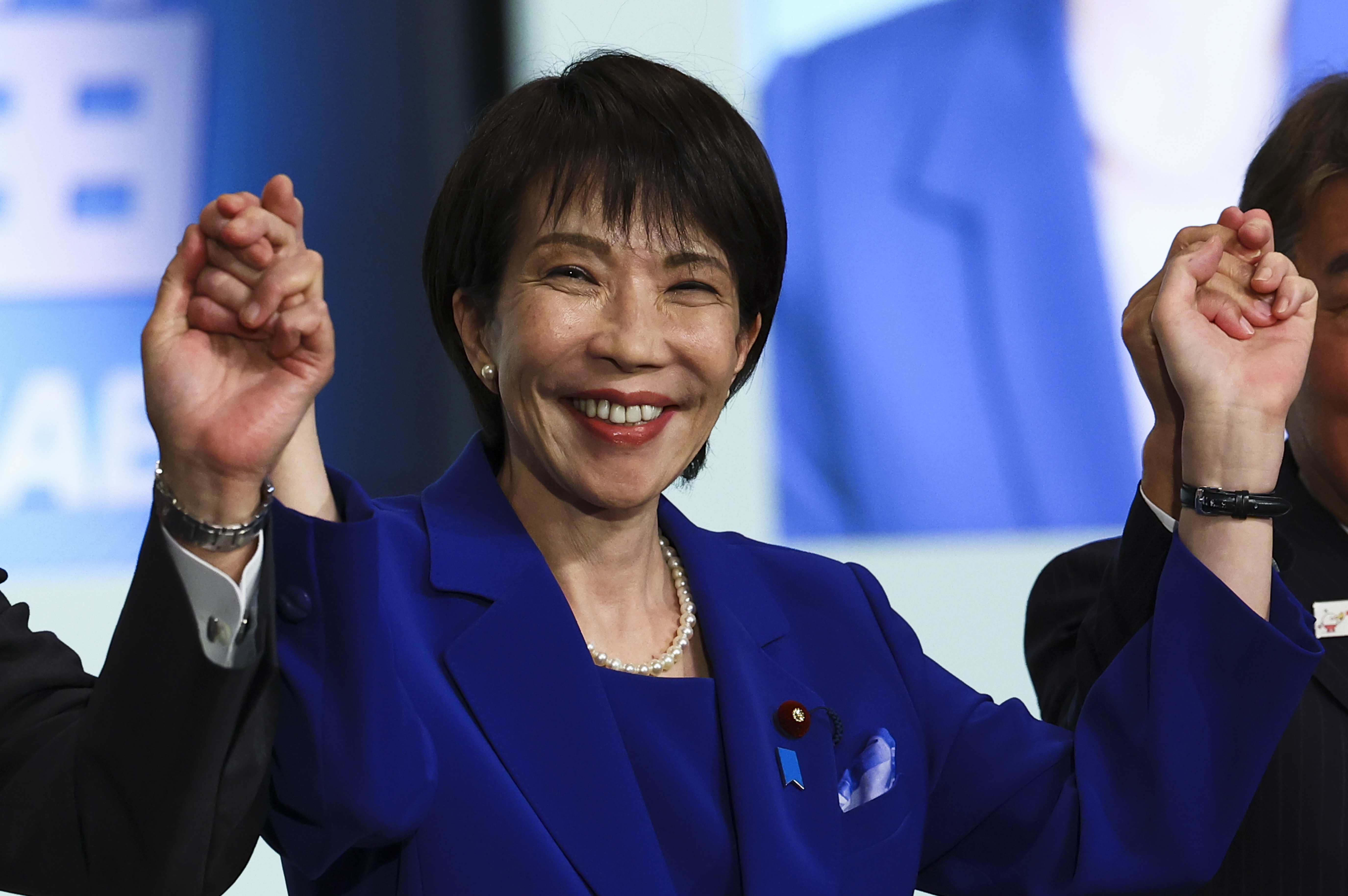 TOKYO, JAPAN - OCTOBER 4: Newly-elected Liberal Democratic Party (LDP) leader Sanae Takaichi celebrates after winning the LDP leadership election on October 4, 2025 in Tokyo, Japan. Japan's ruling Liberal Democratic Party (LDP) held a leadership election on October 4, 2025, to replace Prime Minister Shigeru Ishiba, who resigned after the party lost its parliamentary majority in both houses of the Diet for the first time since 1955. (Photo by Kim Kyung-Hoon - Pool/Getty Images)